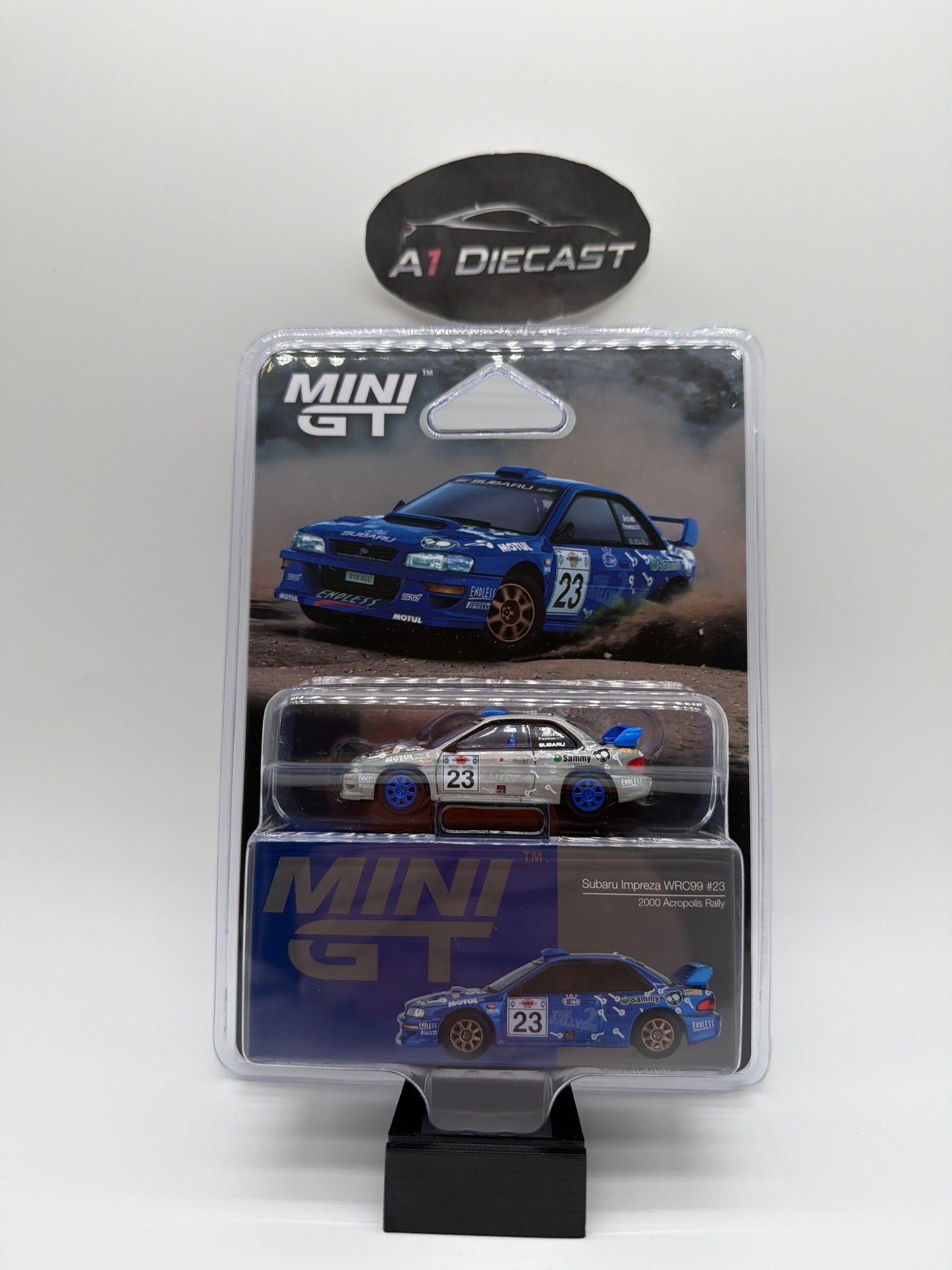Mini GT Subaru Impressa WRC99 #23 2000 Acropolis Rally MGT // 1078 Chase