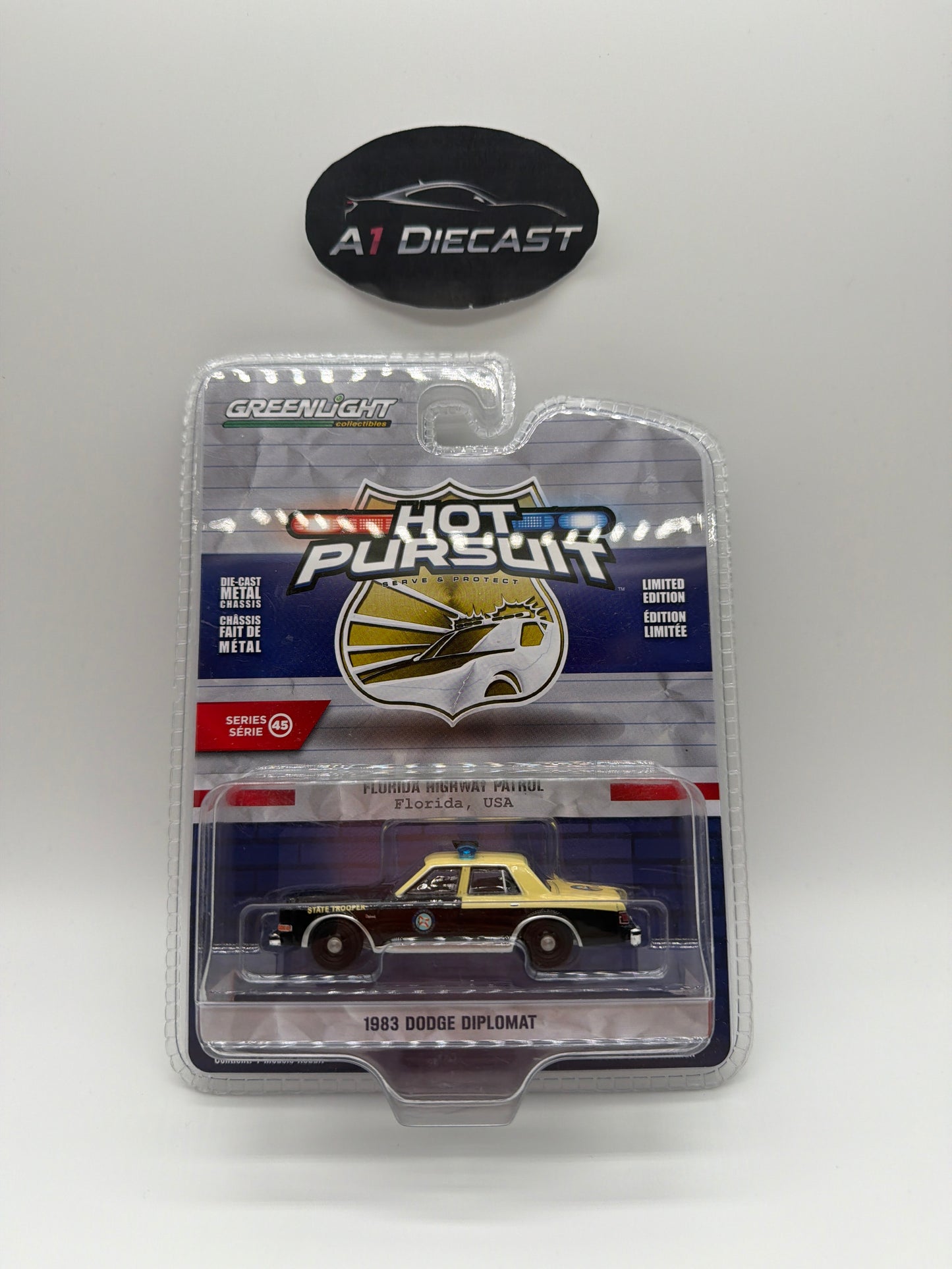 Greenlight Hot Pursuit 1983 Dodge Diplomat Series 45