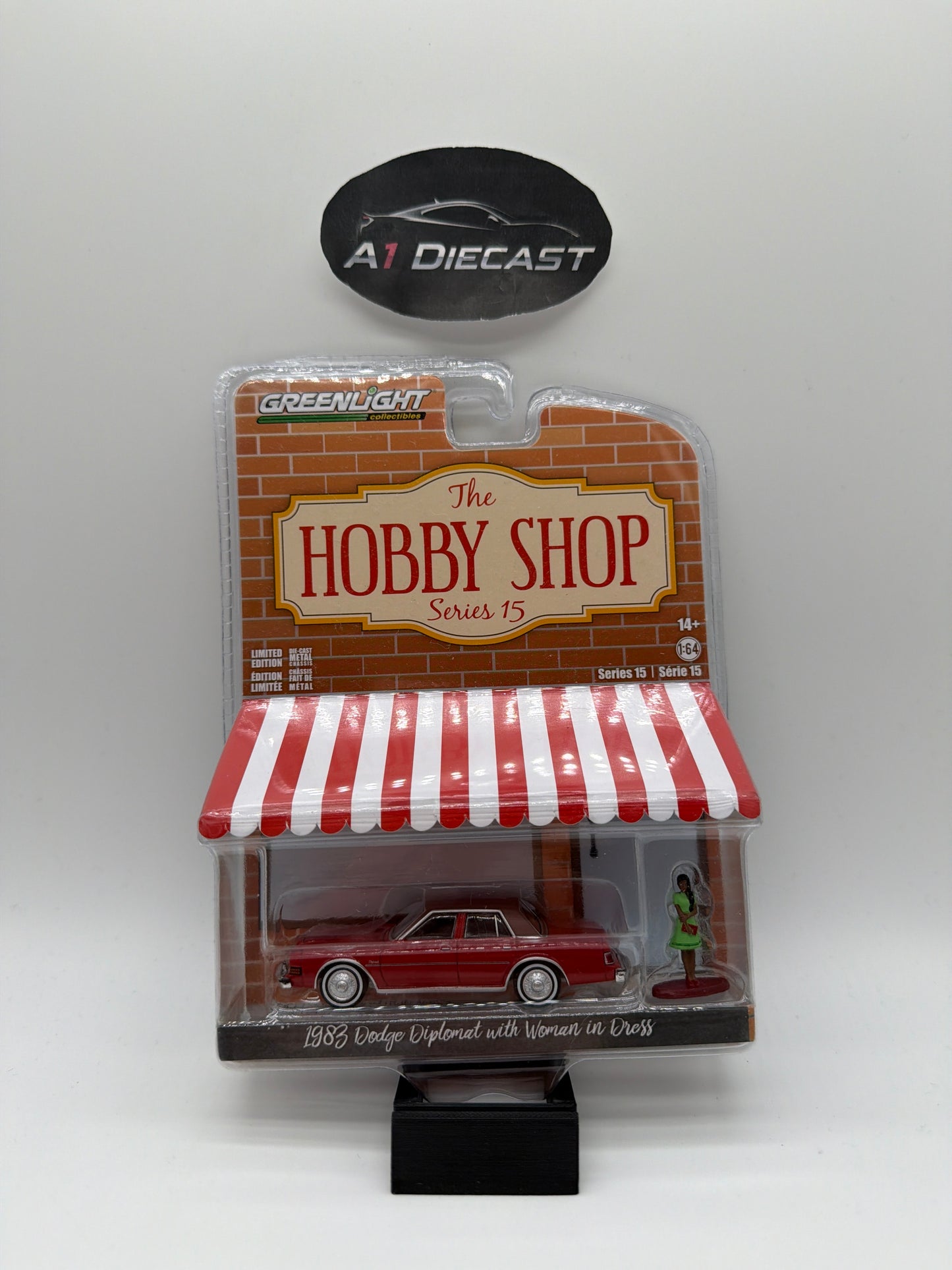Greenlight The Hobby Shop 1983 Dodge Diplomat with Woman in Dress