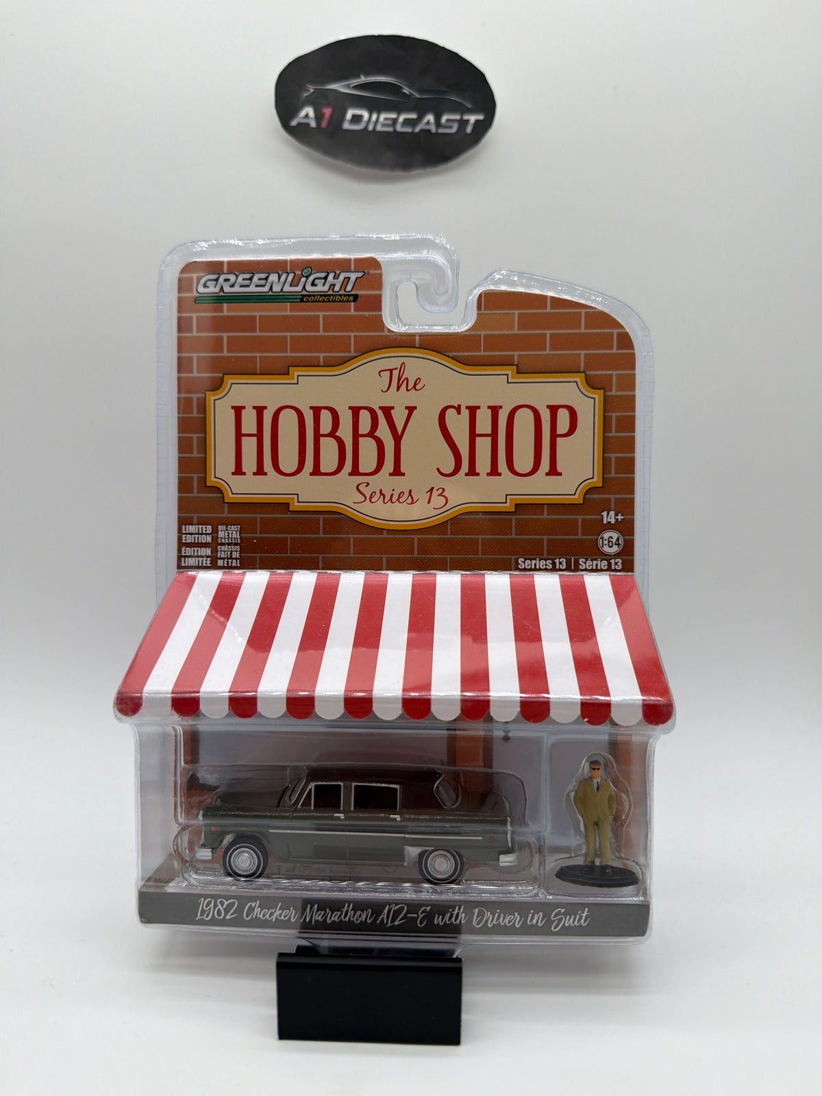 Greenlight The Hobby Shop 1982 Checker Marathon A12-E with Driver in Suit