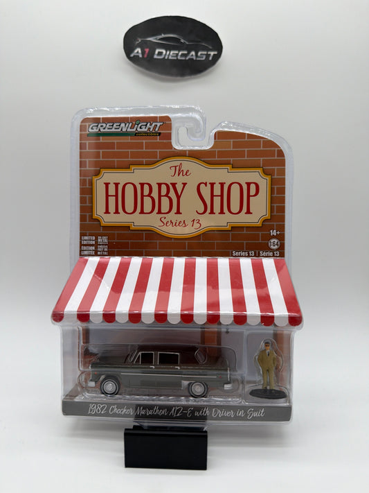 Greenlight The Hobby Shop 1982 Checker Marathon A12-E with Driver in Suit