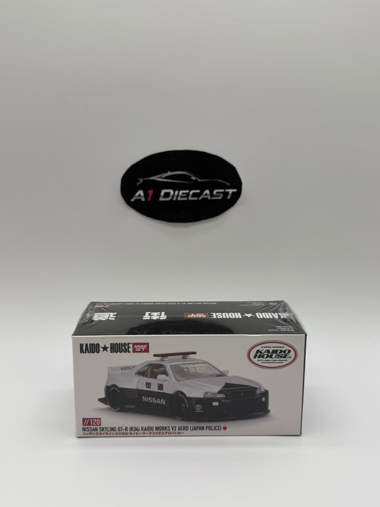 Kaido House Mini GT Nissan Skyline GT-R (R34) Kaido Works V2 Aero (Japan Police)