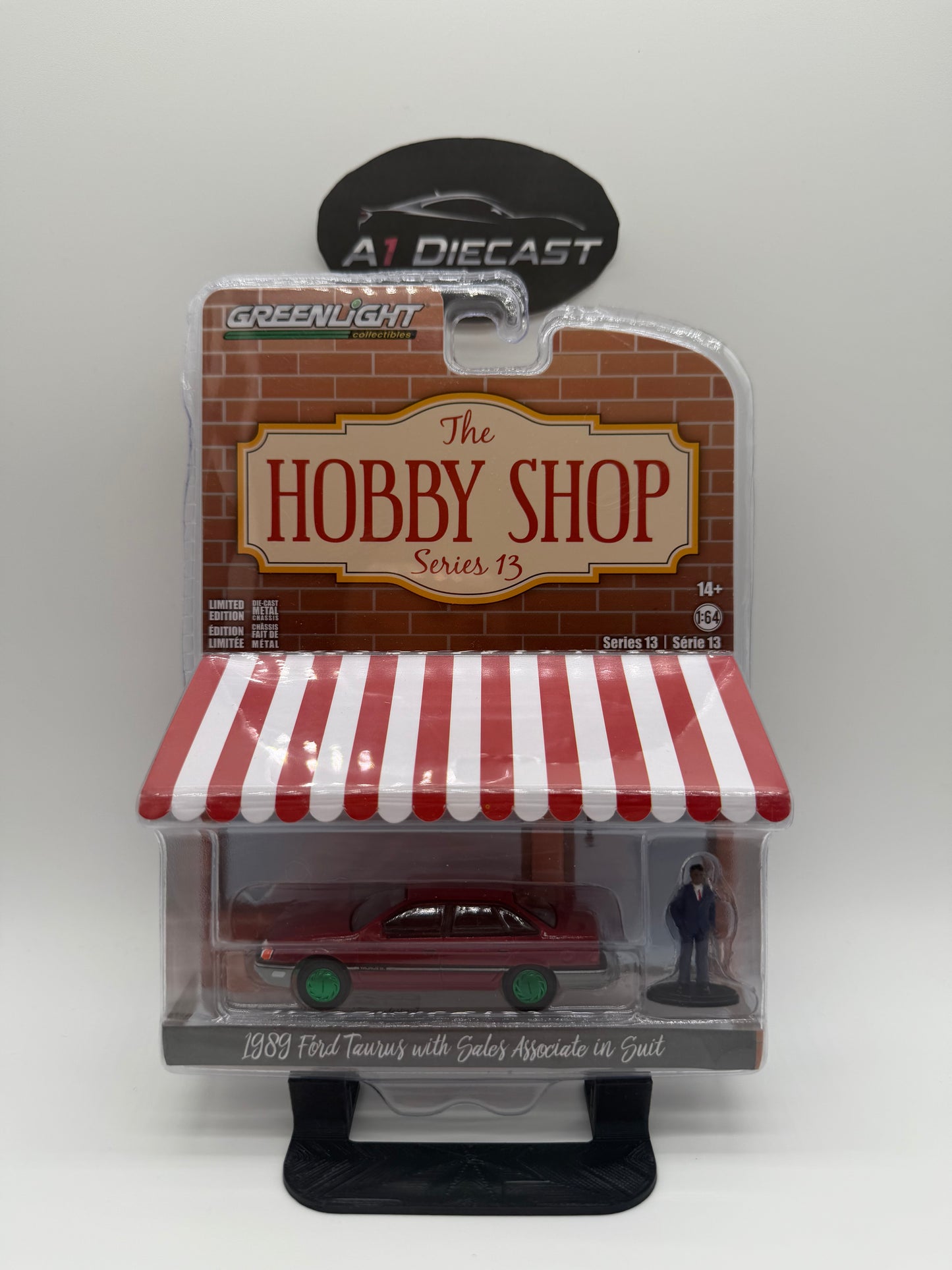Greenlight The Hobby Shop 1989 Ford Taurus with Sales Associate in suit Chase